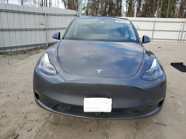 Снимка 5 от търг – 2023 TESLA MODEL Y с VIN 7SAYGDEF9PF935356