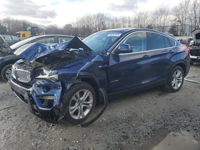 BMW X4 XDRIVE2 2015 with VIN 5UXXW3C56F0M87718 - Photo from auction
