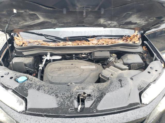 Photo 12 from auction – 2021 HONDA PILOT SE with VIN 5FNYF6H26MB008430