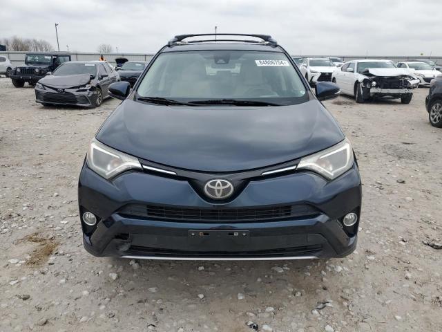 Photo 5 from auction – 2017 TOYOTA RAV4 XLE with VIN JTMWFREV0HD096203