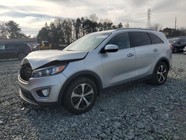 KIA SORENTO EX 2016 with VIN 5XYPH4A16GG013877 - Photo from auction