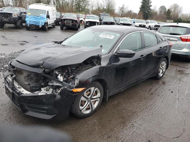 HONDA CIVIC LX 2016 with VIN 2HGFC2F59GH559831 - Photo from auction
