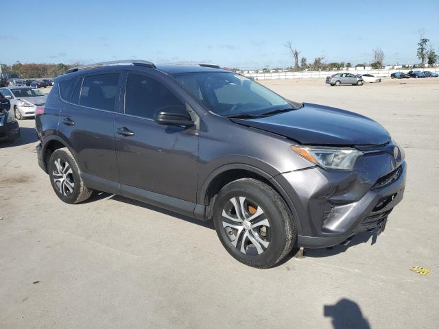 Photo 4 from auction – 2018 TOYOTA RAV4 LE with VIN JTMZFREV2JJ182763