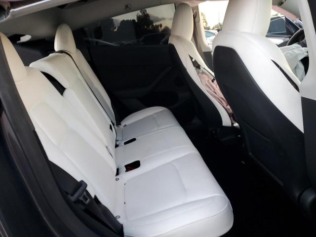 Photo 11 from auction – 2023 TESLA MODEL Y with VIN 7SAYGDEF0PF809287