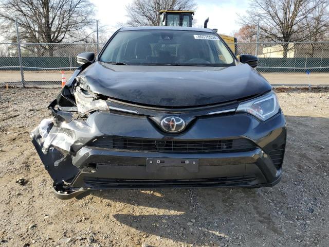 Photo 5 from auction – 2018 TOYOTA RAV4 LE with VIN 2T3ZFREV3JW469143