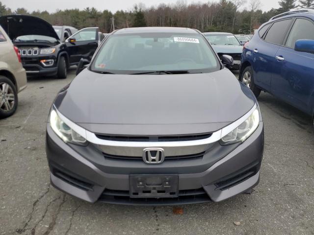 Photo 5 from auction – 2018 HONDA CIVIC EX with VIN 19XFC2F72JE203708