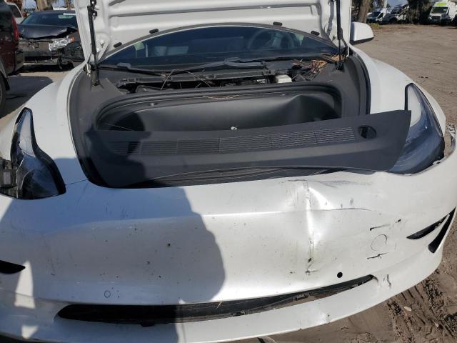 Photo 12 from auction – 2021 TESLA MODEL 3 with VIN 5YJ3E1EA1MF856758