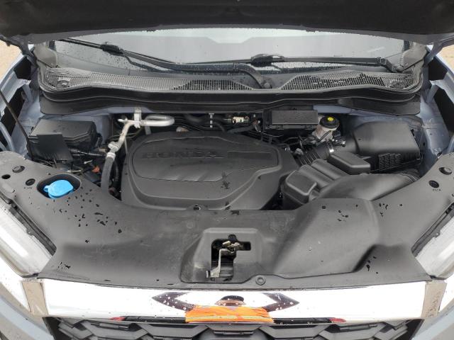 Photo 12 from auction – 2022 HONDA PASSPORT E with VIN 5FNYF7H56NB003813