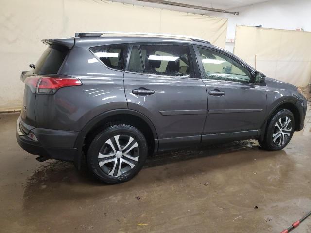 Photo 3 from auction – 2018 TOYOTA RAV4 LE with VIN JTMBFREV2JJ241957