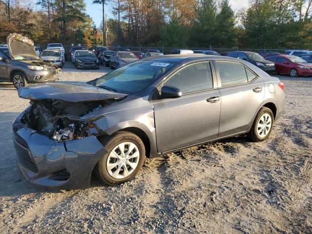 TOYOTA COROLLA L 2018 with VIN 5YFBURHE1JP823013 - Photo from auction
