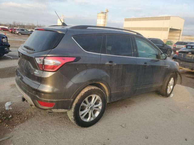 Photo 3 from auction – 2018 FORD ESCAPE SE with VIN 1FMCU9GD7JUD04673