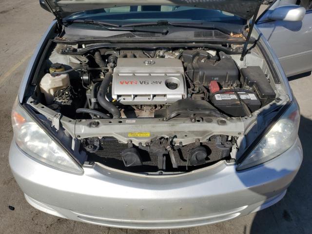 Photo 11 from auction – 2004 TOYOTA CAMRY LE with VIN 4T1BF32K14U077719