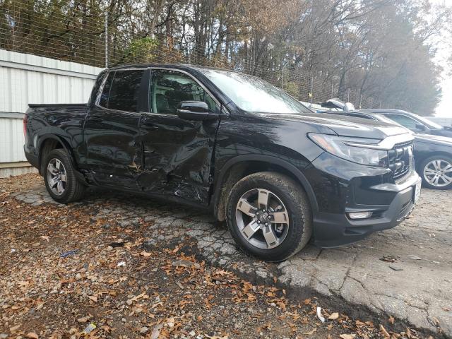 Photo 4 from auction – 2024 HONDA RIDGELINE with VIN 5FPYK3F56RB030904