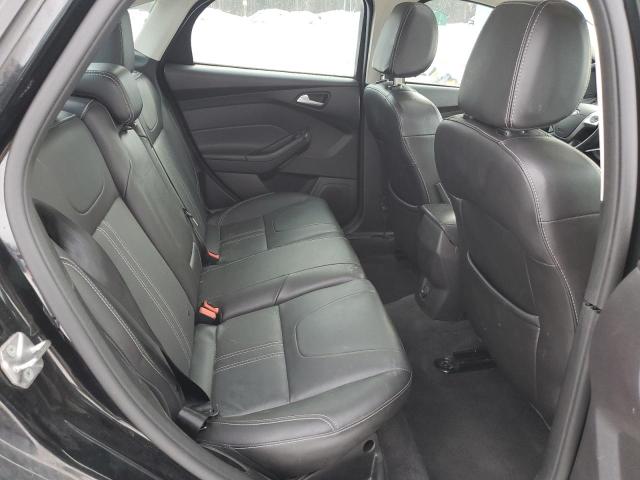 Foto 10 de la subasta – 2014 FORD FOCUS SE con VIN 1FADP3F22EL303722