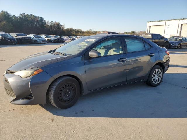 TOYOTA COROLLA L 2017 with VIN 2T1BURHE8HC864734 - Photo from auction
