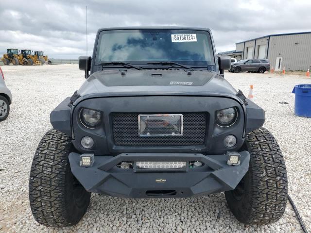 Photo 5 from auction – 2015 JEEP WRANGLER U with VIN 1C4BJWDGXFL580767