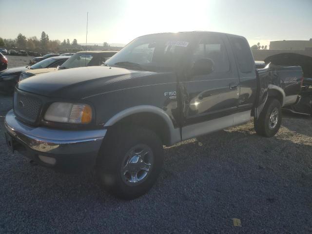 FORD F150 1999 with VIN 1FTRX18L8XKA03556 - Photo from auction