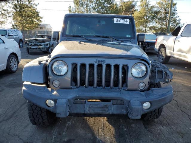 Photo 5 from auction – 2016 JEEP WRANGLER U with VIN 1C4BJWEG1GL255778