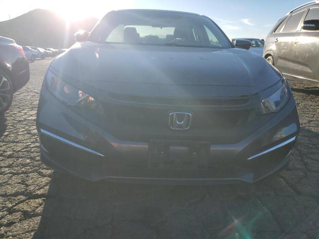 Photo 5 from auction – 2019 HONDA CIVIC LX with VIN 2HGFC2F62KH524128