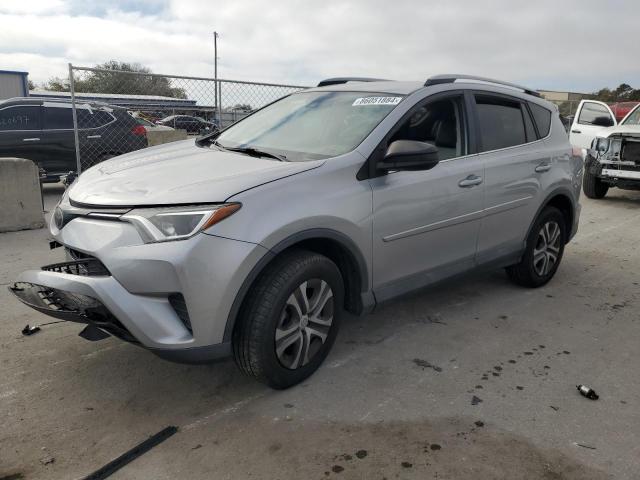 TOYOTA RAV4 LE 2018 with VIN 2T3ZFREV5JW418520 - Photo from auction