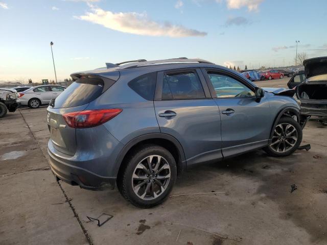 Photo 3 from auction – 2016 MAZDA CX-5 GT with VIN JM3KE2DY0G0791203