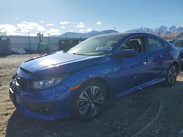 HONDA CIVIC EX 2018 with VIN JHMFC1F45JX003632 - Photo from auction