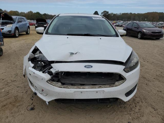 Photo 5 from auction – 2015 FORD FOCUS SE with VIN 1FADP3F23FL381962
