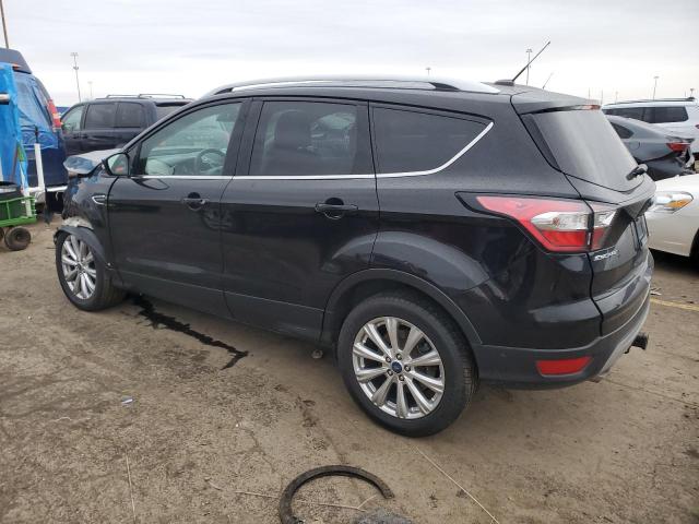 Photo 2 from auction – 2017 FORD ESCAPE TIT with VIN 1FMCU9J91HUD88276