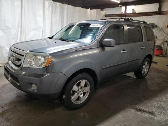 HONDA PILOT EXL 2011 with VIN 5FNYF4H68BB104824 - Photo from auction