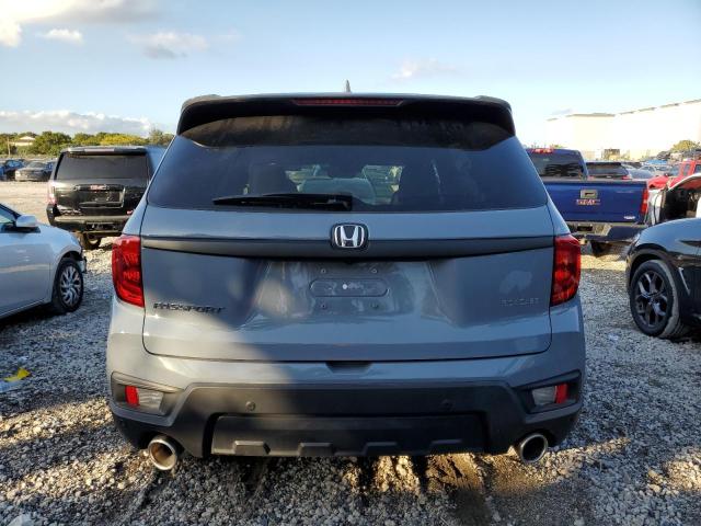 Photo 6 from auction – 2022 HONDA PASSPORT E with VIN 5FNYF7H55NB004533
