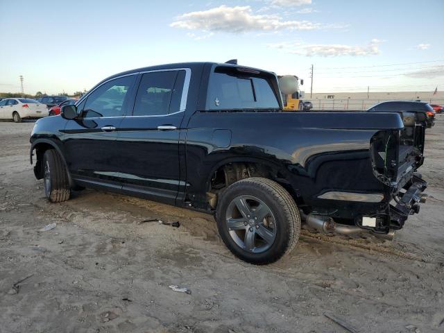 Photo 2 from auction – 2023 HONDA RIDGELINE with VIN 5FPYK3F70PB038897