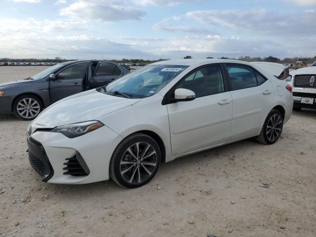 TOYOTA COROLLA L 2017 with VIN 5YFBURHE8HP613776 - Photo from auction