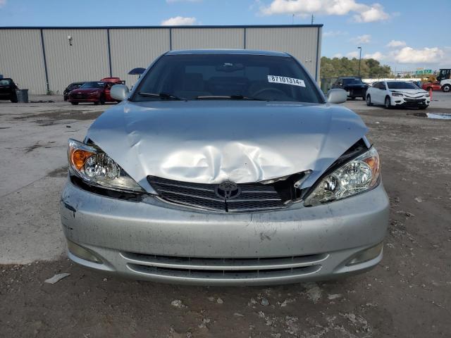 Photo 5 from auction – 2004 TOYOTA CAMRY LE with VIN 4T1BE30K64U878197