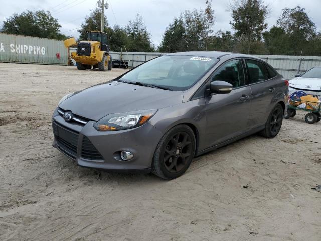 FORD FOCUS SE 2014 with VIN 1FADP3F20EL330899 - Photo from auction