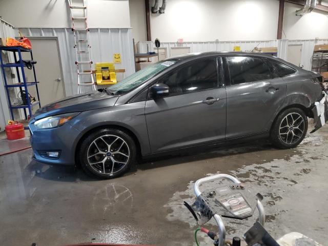 FORD FOCUS SEL 2017 with VIN 1FADP3H26HL301876 - Photo from auction