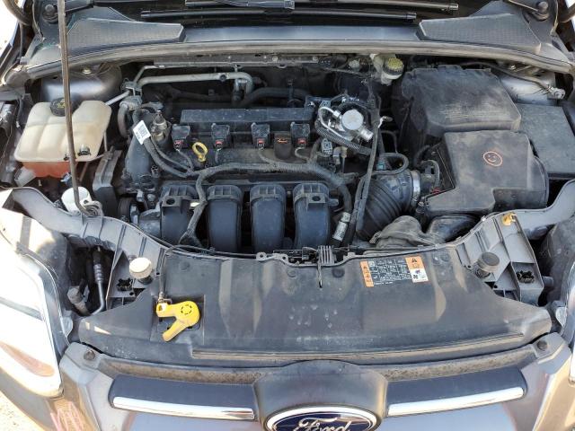 Photo 11 from auction – 2014 FORD FOCUS SE with VIN 1FADP3F28EL390414