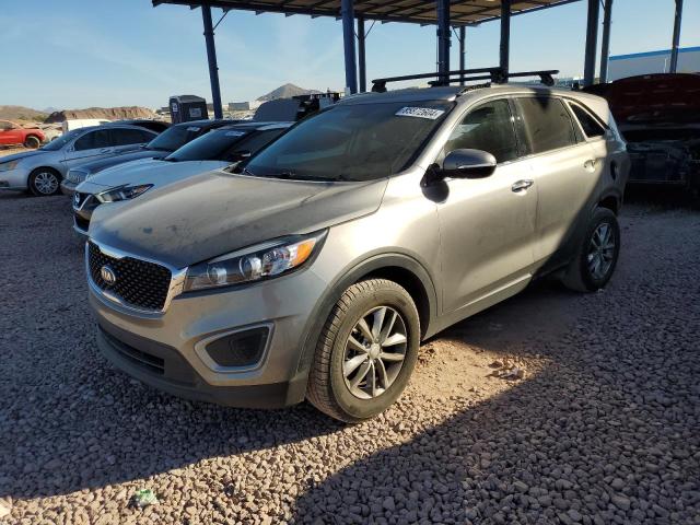 KIA SORENTO LX 2016 with VIN 5XYPG4A32GG010849 - Photo from auction