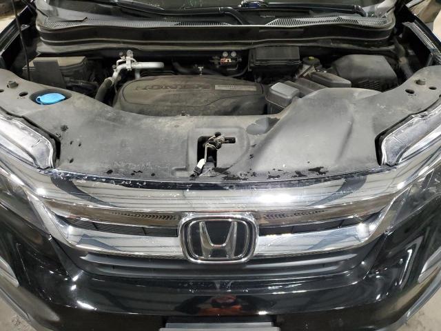Photo 12 from auction – 2019 HONDA PILOT LX with VIN 5FNYF6H18KB025587
