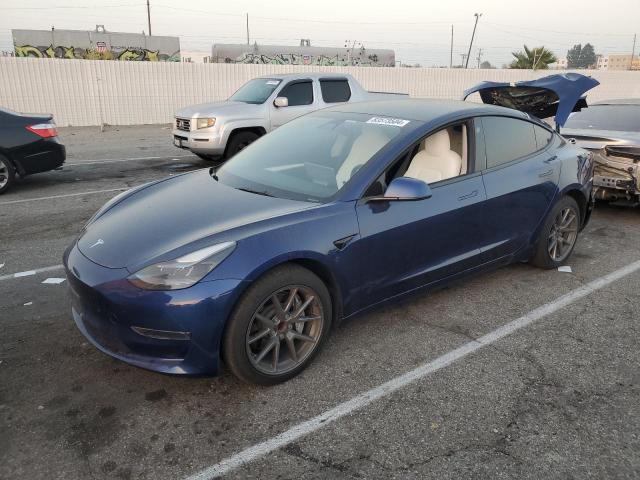 TESLA MODEL 3 2022 with VIN 5YJ3E1EA2NF117237 - Photo from auction