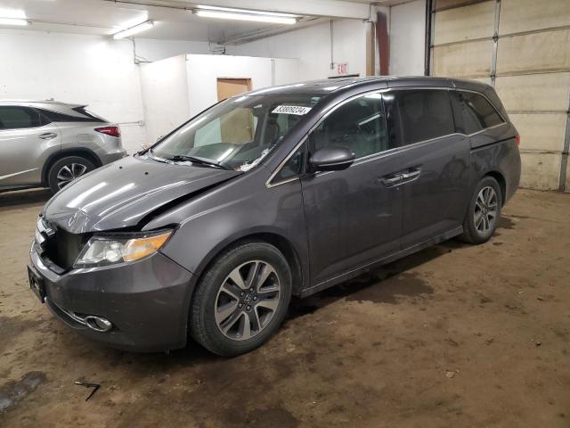 Photo 1 from auction – 2014 HONDA ODYSSEY TO with VIN 5FNRL5H97EB073759