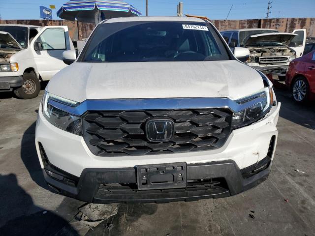 Photo 5 from auction – 2023 HONDA PASSPORT E with VIN 5FNYF8H57PB007667
