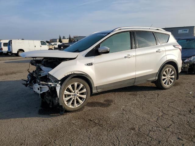 FORD ESCAPE TIT 2017 with VIN 1FMCU0J97HUC14109 - Photo from auction