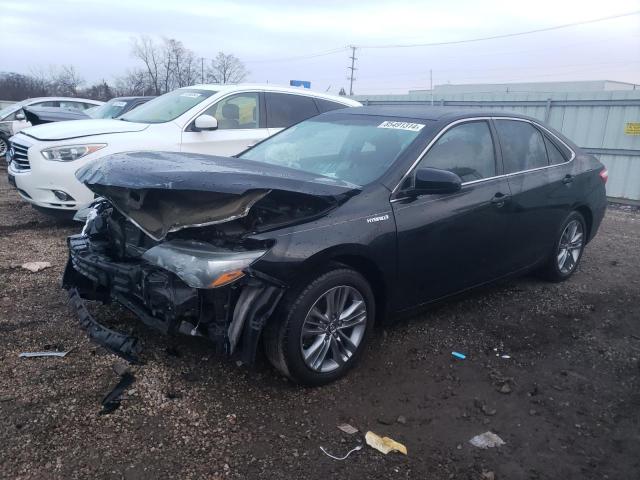 TOYOTA CAMRY HYBR 2015 with VIN 4T1BD1FK6FU167097 - Photo from auction