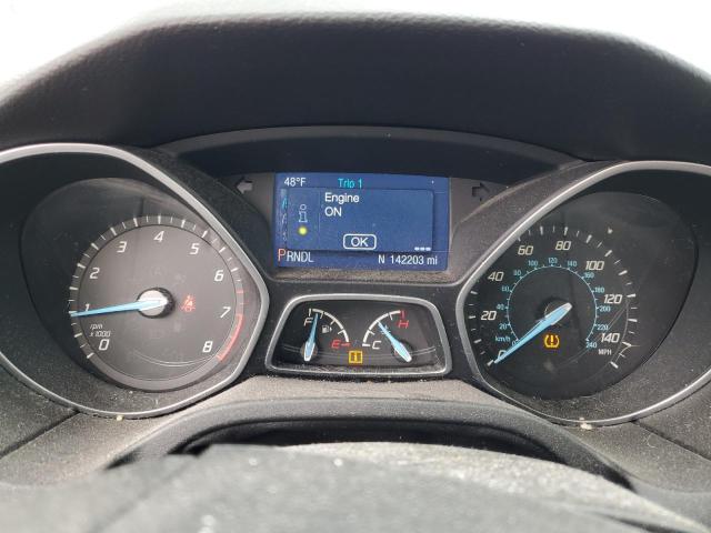 Photo 9 from auction – 2014 FORD FOCUS SE with VIN 1FADP3F21EL201831