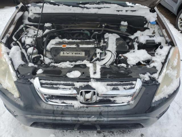 Photo 11 from auction – 2002 HONDA CR-V EX with VIN JHLRD78802C067037