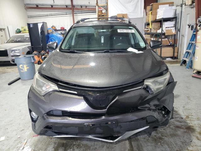 Photo 5 from auction – 2016 TOYOTA RAV4 XLE with VIN 2T3RFREV5GW460033