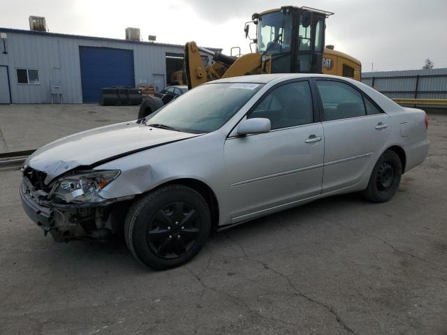 TOYOTA CAMRY LE 2002 with VIN JTDBE32K320021289 - Photo from auction