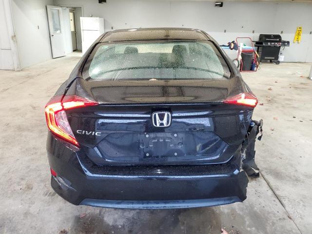 Photo 6 from auction – 2018 HONDA CIVIC LX with VIN 19XFC2E59JE018703