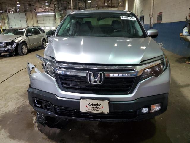 Photo 5 from auction – 2017 HONDA RIDGELINE with VIN 5FPYK3F55HB002624