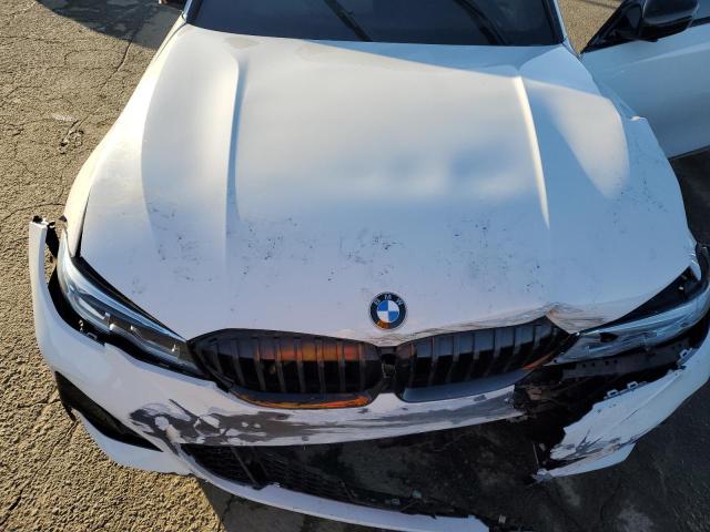 Photo 11 from auction – 2021 BMW 330I with VIN 3MW5R1J01M8B92862